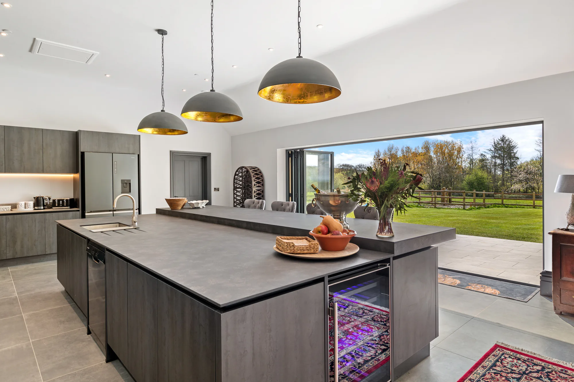 Kitchen and dining area in The Courtyard at Glaneirw Estate